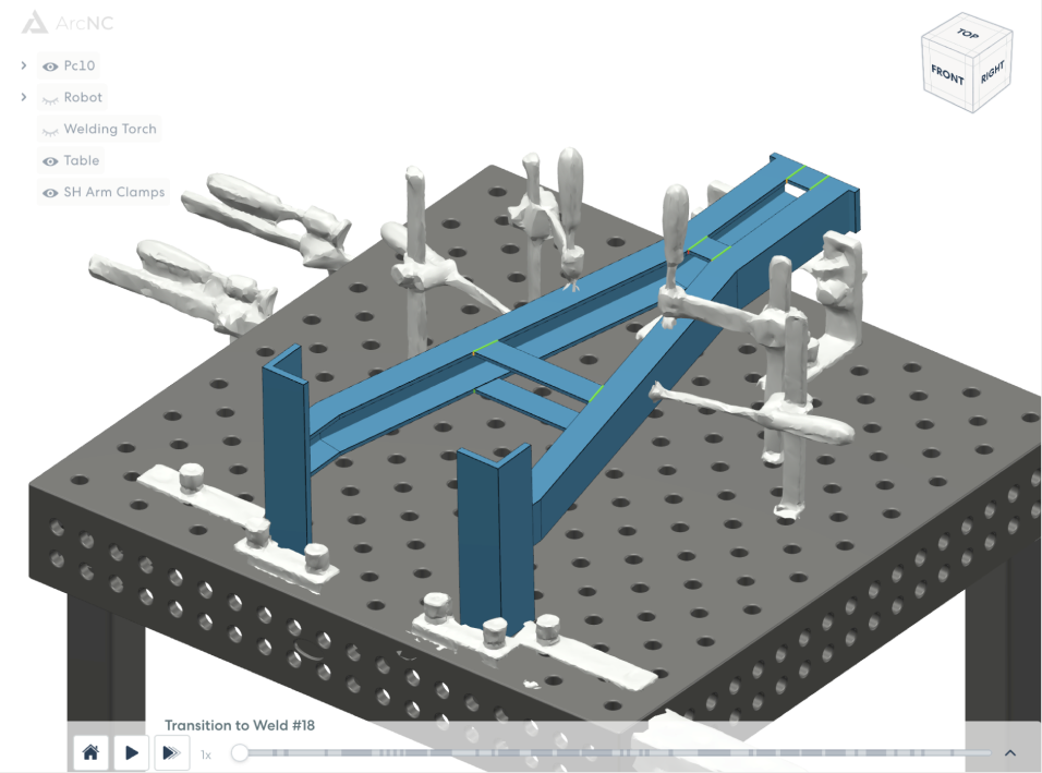 ArcNC cell view containing workpiece, clamps and collision geometries